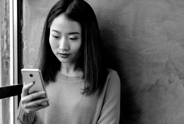 Illustration of person relaxing on phone